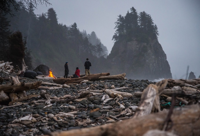 Campfire on rocky beach